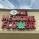 Okie Medicine Flower logo